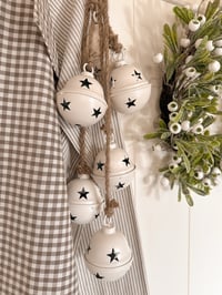 Image 1 of String of white star bells