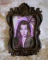 Morticia Addams Framed Print
