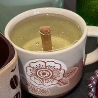 Image 3 of leather & rose scented candle