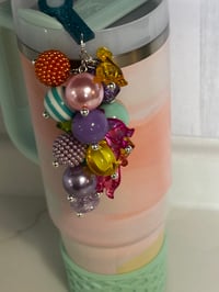 Image 3 of Warm Serene Brushstrokes Dinosaur Tumbler Accessory Set | Bow, Straw Bauble & Bracelets