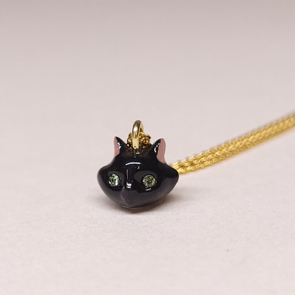 Image of Black Porcelain & Gold Vermeil Teeny Tiny Cat Pendant