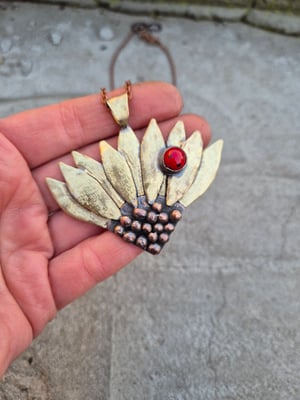 Sunflower pendant with ladybug 