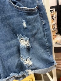 Image 3 of distressed fashion Nova shortly