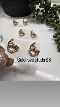 Gold love studs 