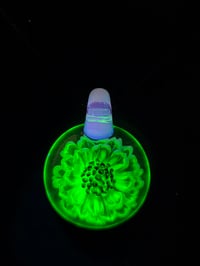 Image 3 of Uv reactive flower pendant..