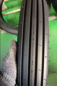 Image 1 of 21 Ribbed Board Track Tire 