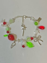 Image 3 of cluttered strawberry bracelet