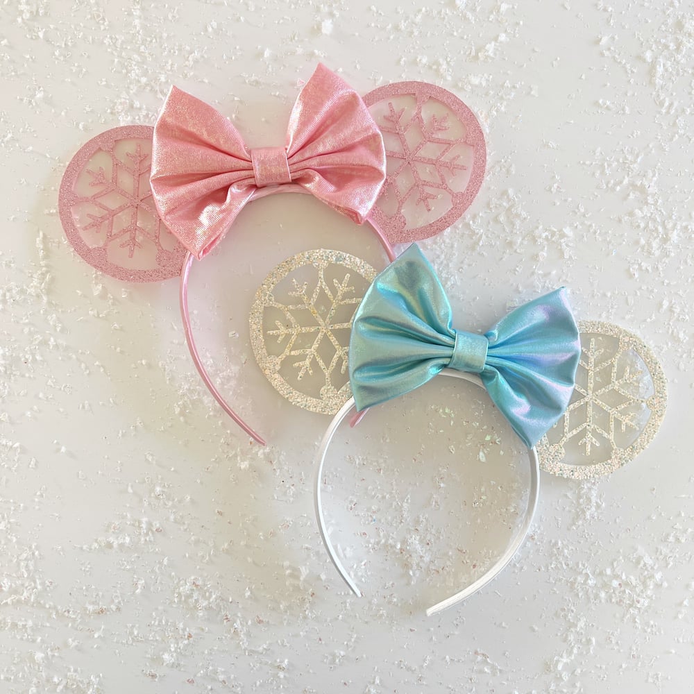 Image of Shimmer Snowflake Ears with Iridescent Bow 