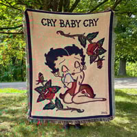 Image of “Cry Baby Cry” Woven Blanket