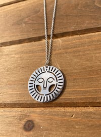 sun pendant 