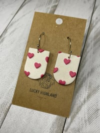 Dainty heart dangles 