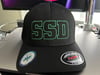 Black Flexfit hat with Green Outline SSD logo with rear “Boston Crew” logo