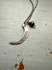Image 5 of sterling silver moon pendant with brave inscription and green tourmaline