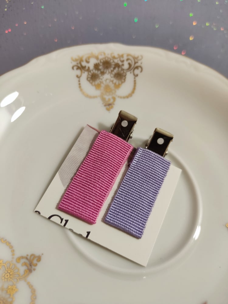 Image of Clip barrette lilla e rosa