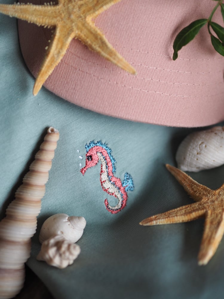 Image of Summer Sprinkle Tee, Sandy The Seahorse - Aloe