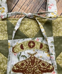 Image 4 of moth garden quilted bag