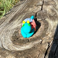 Image 1 of Dragon with Orange Starfish