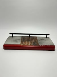 Image 3 of Brick sidewalk with low round rail