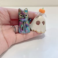 Image 7 of Glow in dark ghost mask, pumpkin, and spider black cat ceramic figurine (rainbow effect)