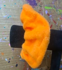 Image 3 of orange fluff