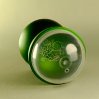 Image 3 of metal capsule (green teddy)