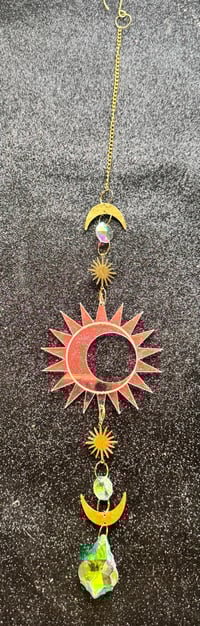 The sun and moon suncatcher