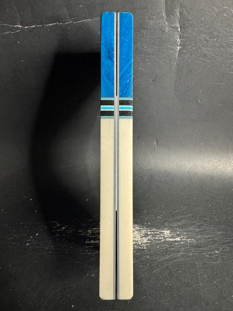 Image of Teal Juma Gem Resin & Elforyn Super Tusk Segmented Knife Scales