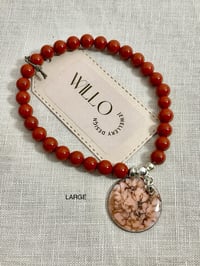 Red Jasper bracelet with enamel charm. 