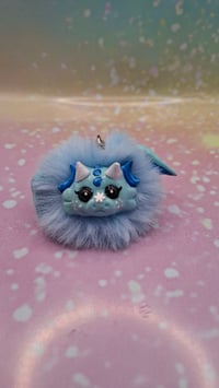 Image 1 of Ice Blue Fluffennutter keychain 