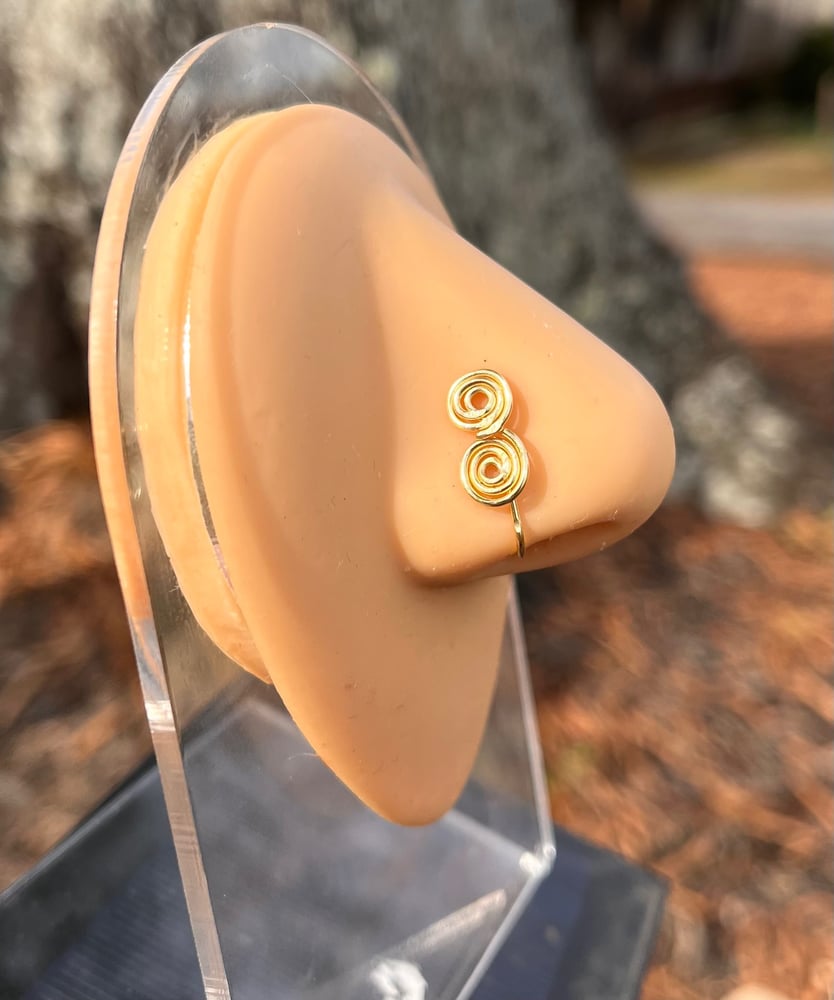 Image of Double swirl nose cuff