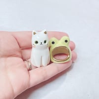 Image 4 of white cat with frog hat ceramic figurine