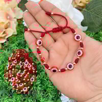 Image 2 of 7 knot bracelet with evil eyes