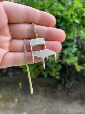 Modern chair necklace in bronze 