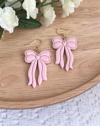 Image 1 of Coquette Pink Bow Dangly Earrings 
