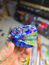 Image 3 of Double amber purple T-Rex skull joint tip pendant (uv reactive) 😤🦖☠️
