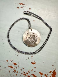 Image 11 of sapphire pendant with hand engraved Shakespeare quote