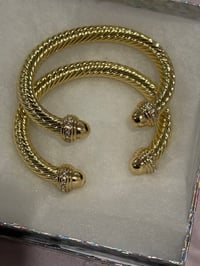 Image 1 of gold puff bangles 