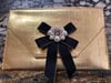 Gold clutch 