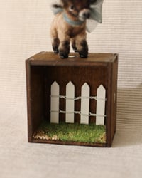 Image 4 of pipe cleaner Cocoa the dwarf goat