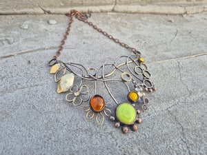Green, orange and yellow flowers necklace 