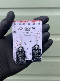 Never Trust The Living Earrings 