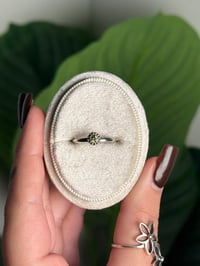 Image 1 of .925 SS DAINTY PERIDOT RING ADJUSTABLE SIZES 5-12