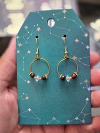 Golden hoops with tigers eye