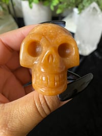 Image 1 of Orange Calcite Skull