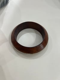 Image 1 of wooden bangle with studs