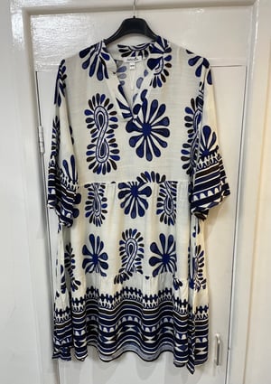 Image of  TRIBAL FLORAL V-NECK SMOCK DRESS