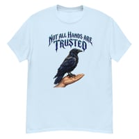Image 5 of Trust Your Instincts Raven Unisex Graphic Tee – Gothic Raven & Hand Streetwear Design