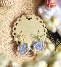 gold flake rose bow 