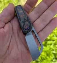 Image 1 of Bottle Opening Friction Folder 