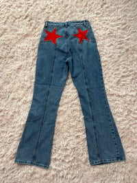 Image 1 of Red Star Flared Pants. 